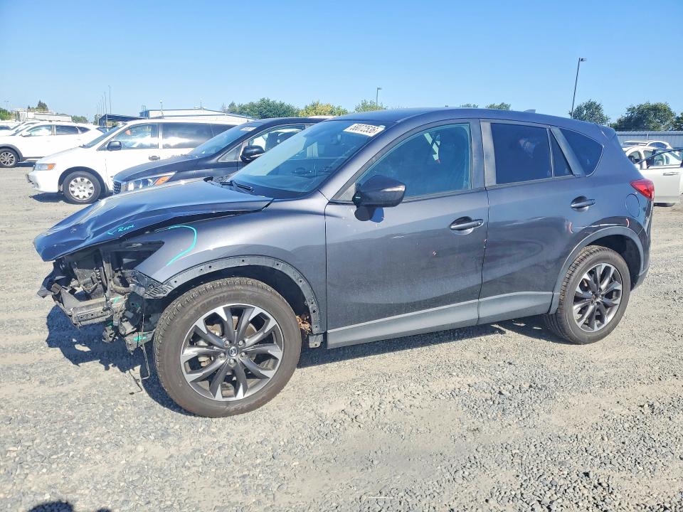 2016 Mazda VIN JM3KE4DY4G0792219 COPART salvage auction — FRONT END, Ca - Salvage Certificate, sold $2,500 on 2026-07-14 (photo 1)