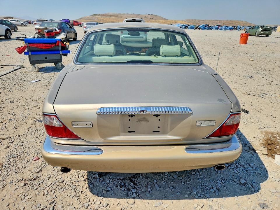 2000 Jaguar Vandenplas VIN SAJDA24C6YLF03755 COPART salvage auction — MECHANICAL, Ut - Certificate Of Title, sold $150 on 2026-07-02 (photo 6)
