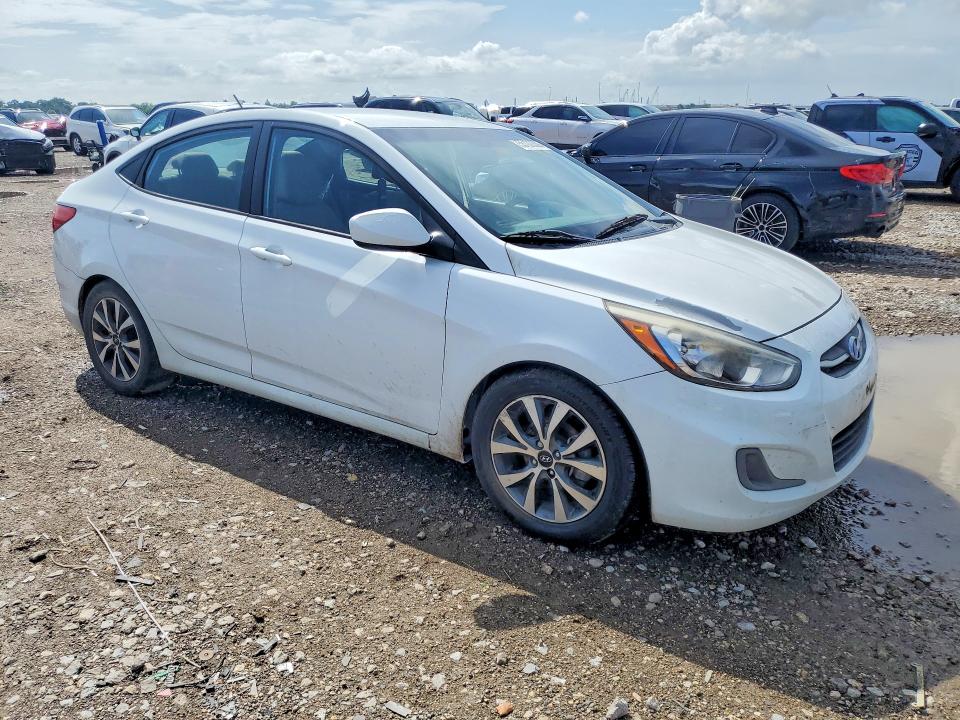 2017 Hyundai Accent VIN KMHCT4AE0HU352727 COPART salvage auction — WATER/FLOOD, Tx - Salvage Title-Flood Damage, sold $675 on 2026-07-09 (photo 4)