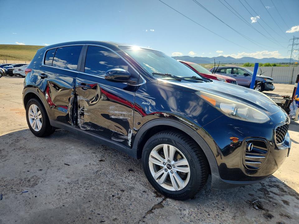 2017 Kia Sportage VIN KNDPMCAC2H7157111 COPART salvage auction — SIDE, Co - Salvage Title, sold $2,200 on 2026-07-13 (photo 4)