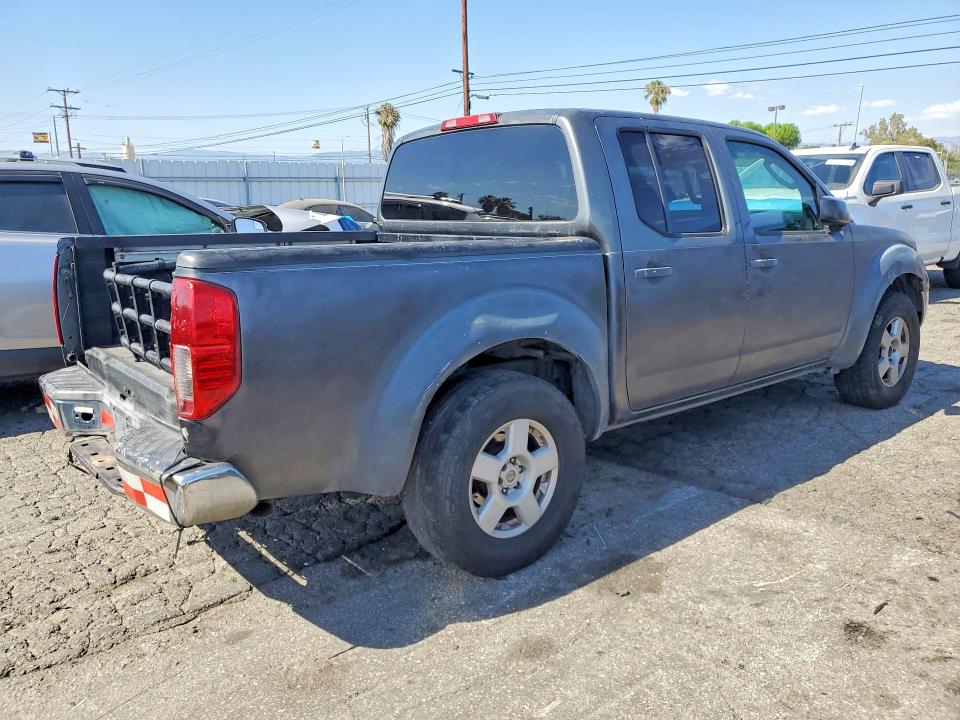 2006 Nissan Frontier VIN 1N6AD07U86C411751 COPART salvage auction — MINOR DENT/SCRATCHES, Az - Dis/Dlr/Exp Only Clean Title, sold $1,000 on 2026-07-02 (photo 3)