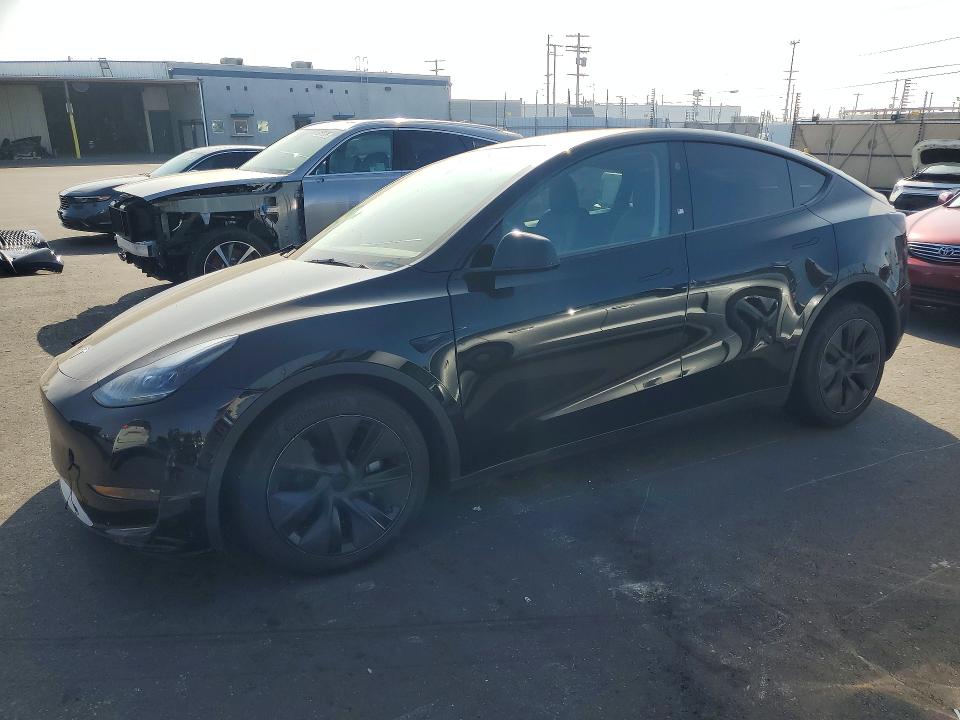 2024 Tesla Model y VIN 7SAYGDED9RF120883 COPART salvage auction — FRONT END, Ca - Salvage Certificate, sold $9,400 on 2026-07-06 (photo 1)