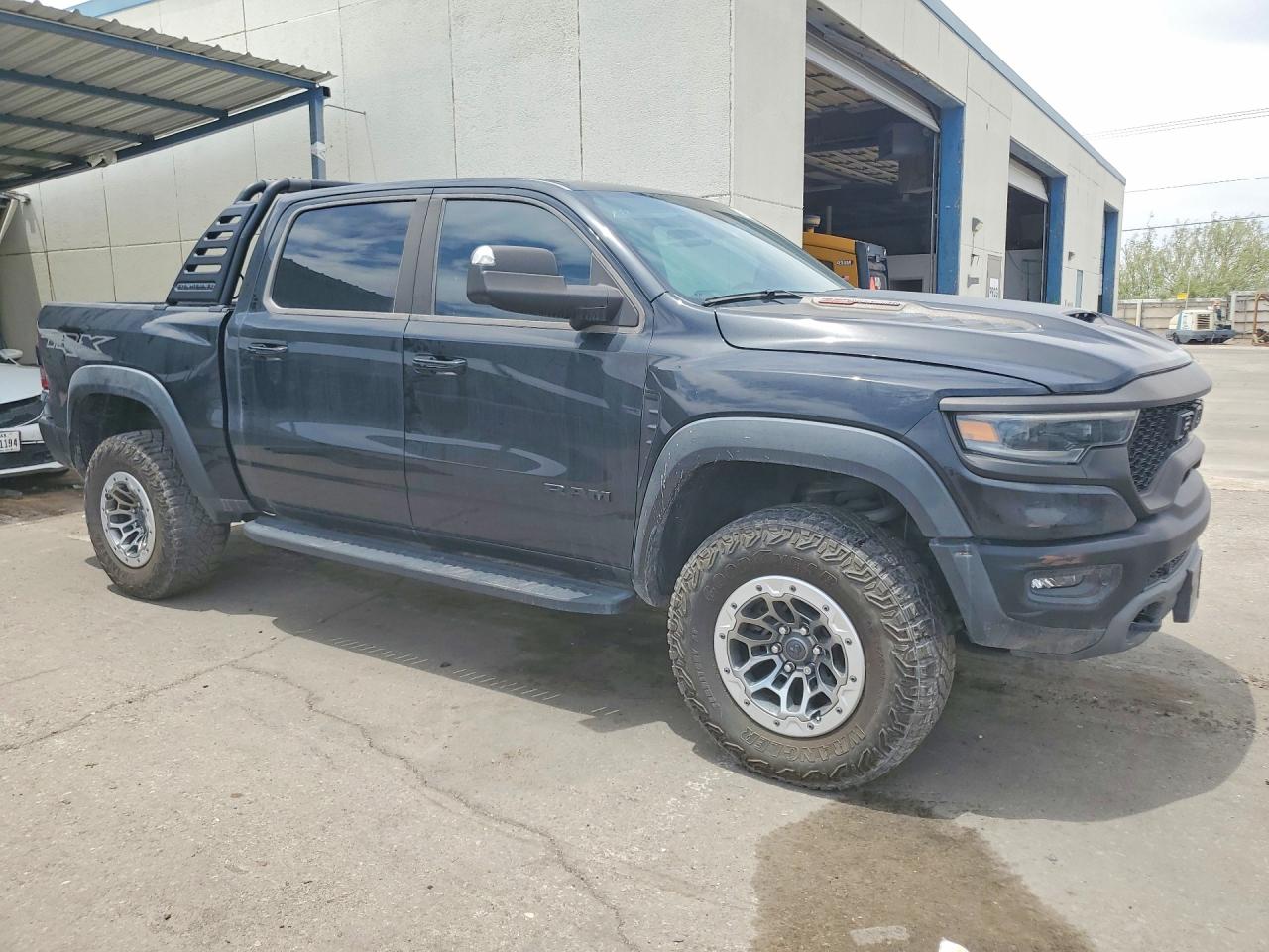 2023 Ram 1500 VIN 1C6SRFU91PN511442 COPART salvage auction — Minor Dent/Scratches, TX - CERTIFICATE OF TITLE, sold $74,500 on 2026-06-26 (photo 4)
