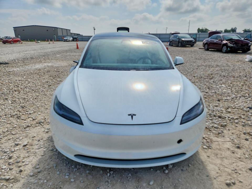 2026 Tesla VIN 5YJ3E1EA8TF139451 COPART salvage auction — SIDE, Tx - Salvage Vehicle Title, sold $13,400 on 2026-08-20 (photo 5)