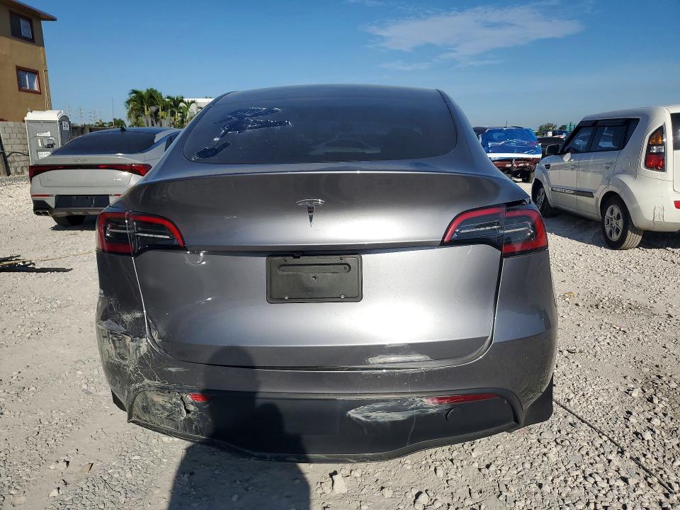 2025 Tesla Model y VIN 7SAYGDED6SF256667 COPART salvage auction — FRONT END, Fl - Cert Of Title Slvg Rebuildable, sold $15 on 2026-07-24 (photo 6)