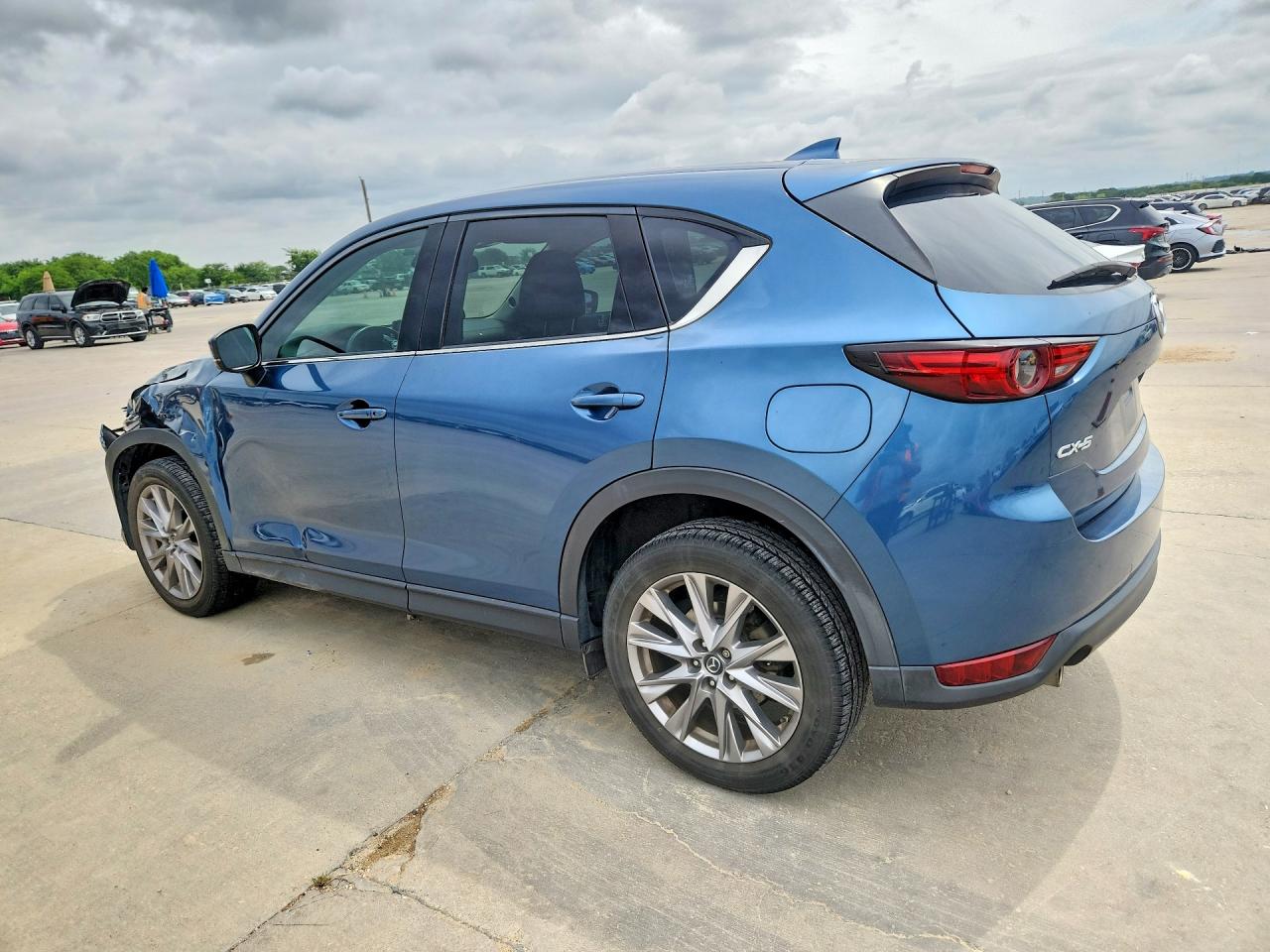 2019 Mazda CX-5 VIN JM3KFADM9K1669737 COPART salvage auction — Side, Sv - Salvage Title, sold $4,750 on 2026-07-09 (photo 2)