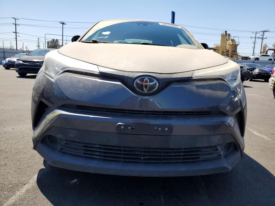2019 Toyota C-hr VIN JTNKHMBX1K1025243 COPART salvage auction — SIDE, Ca - Salvage Certificate, sold $4,500 on 2026-07-06 (photo 5)