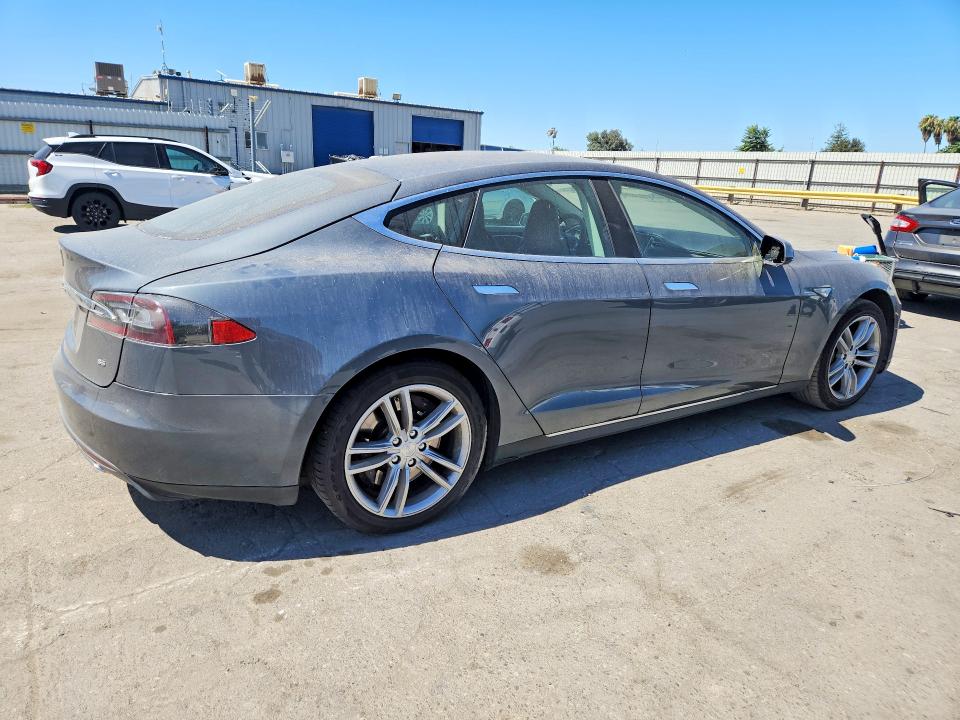2013 Tesla Model s VIN 5YJSA1DNXDFP05607 COPART salvage auction — NORMAL WEAR, Ca - Dis/Dlr/Exp Only Clean Title, sold $2,550 on 2026-07-31 (photo 3)