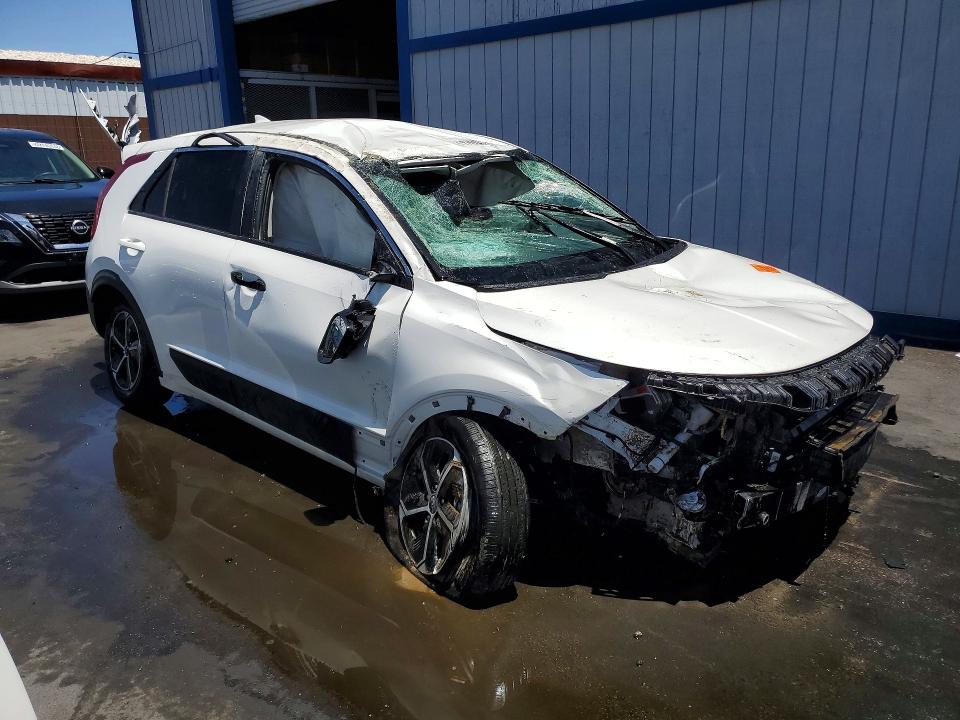 2026 Kia Niro VIN KNDCP3LE7T5328850 COPART salvage auction — ALL OVER, NV - SALVAGE TITLE, sold $425 on 2026-07-27 (photo 4)