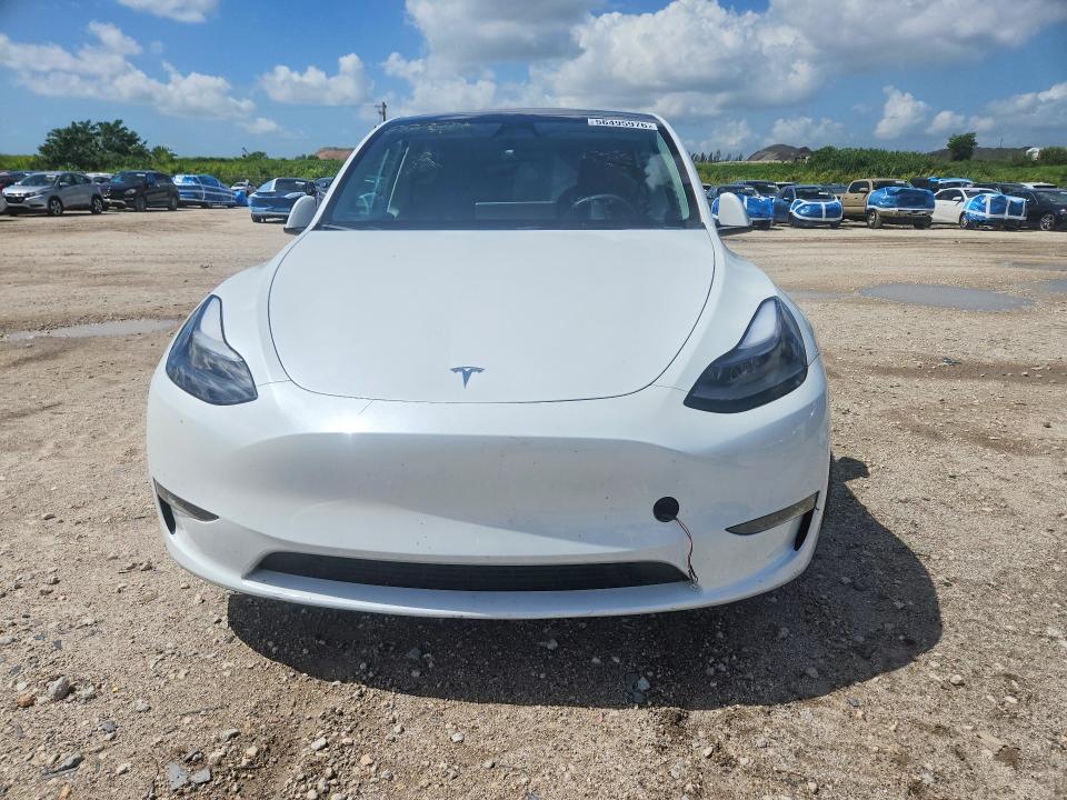 2024 Tesla Model y VIN 7SAYGDEE0RA246992 COPART salvage auction — REAR END, Salvage Title, sold $11,800 on 2026-07-16 (photo 5)
