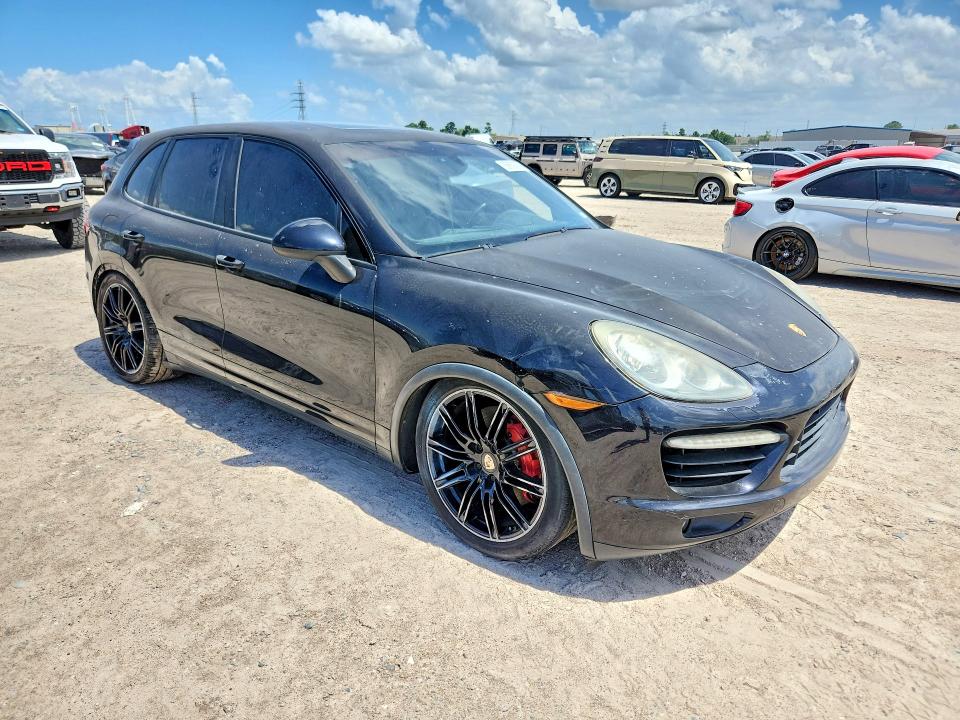 2011 Porsche Cayenne VIN WP1AC2A26BLA85286 COPART salvage auction — WATER/FLOOD, TX - SALVAGE TITLE-FLOOD DAMAGE, sold $1,850 on 2026-07-07 (photo 4)