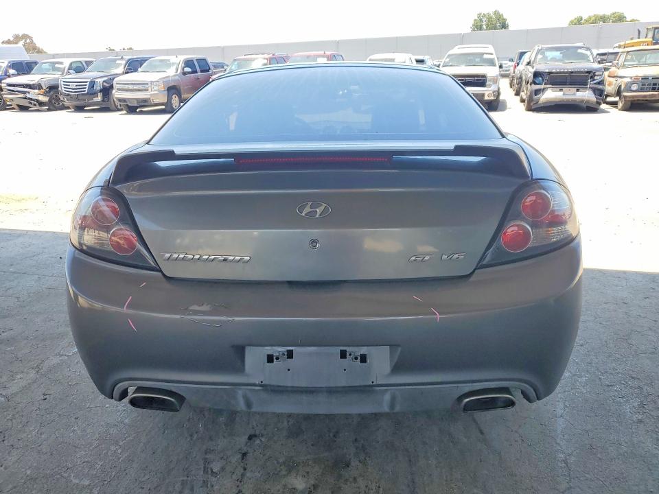 2007 Hyundai Tiburon VIN KMHHN66F77U237425 COPART salvage auction — FRONT END, Ca - Salvage Certificate, sold $150 on 2026-07-30 (photo 6)