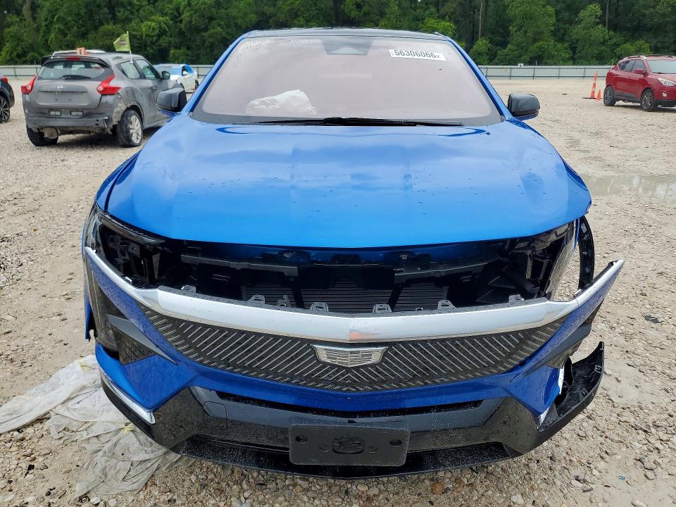 2026 Cadillac Optiq VIN 3GYK3DM40TS123535 COPART salvage auction — UNKNOWN, Tx - Certificate Of Title, sold $8,300 on 2026-10-04 (photo 5)