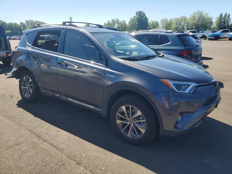 2018 Toyota Rav 4 VIN JTMRJREV8JD216590 COPART salvage auction — REAR END, Or - Salvage Title Certificate, sold $7,000 on 2026-07-22 (photo 4)