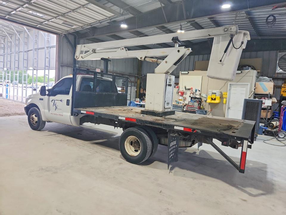2004 Ford F-350 super duty VIN 1FDWF36L24EC52168 COPART salvage auction — HAIL, Mo - Salvage Certificate Of Title, sold $2,700 on 2026-07-09 (photo 2)
