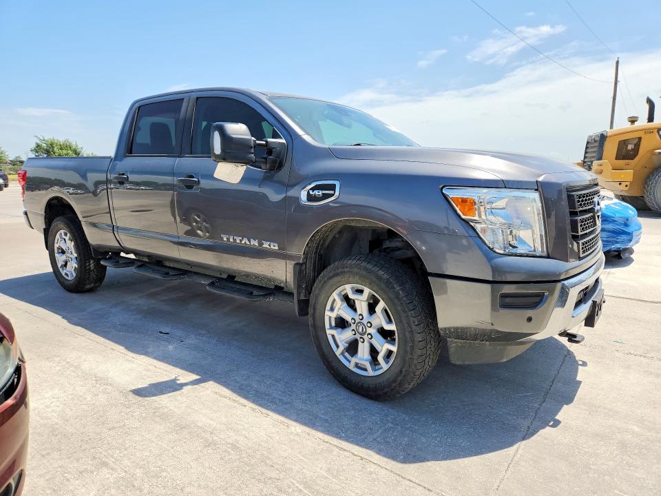 2022 Nissan VIN 1N6AA1FB6NN100112 COPART salvage auction — NORMAL WEAR, Tx - Certificate Of Title (P), sold $8,700 on 2026-07-28 (photo 4)