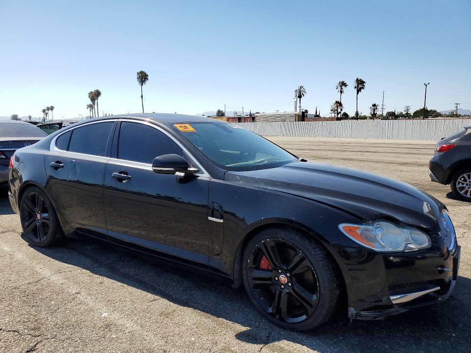 2011 Jaguar Xf VIN SAJWA0HE8BMR88679 COPART salvage auction — MINOR DENT/SCRATCHES, Ca - Dis/Dlr/Exp App For Dup Clean, sold $850 on 2026-07-24 (photo 4)