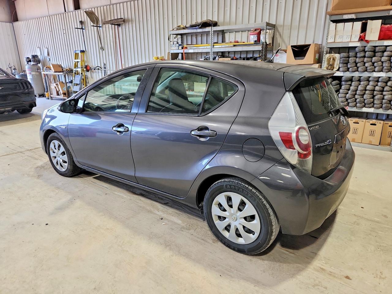2014 Toyota Prius C VIN JTDKDTB30E1067916 COPART salvage auction — Mechanical, WV - CERTIFICATE OF TITLE, sold $1,500 on 2026-07-07 (photo 2)