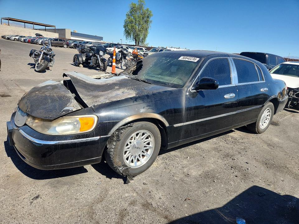 1998 Lincoln TOWN CAR VIN 1LNFM82W9WY669730 COPART salvage auction — ENGINE BURN, Nv - Non-Repairable Vehicle Cert, sold $125 on 2026-07-08 (photo 1)