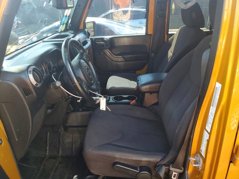 2014 Jeep Wrangler unlimited VIN 1C4BJWDG1EL276774 COPART salvage auction — MINOR DENT/SCRATCHES, Mi - Cert Of Title-Rebuilt Salvage, sold $6,800 on 2026-07-02 (photo 7)