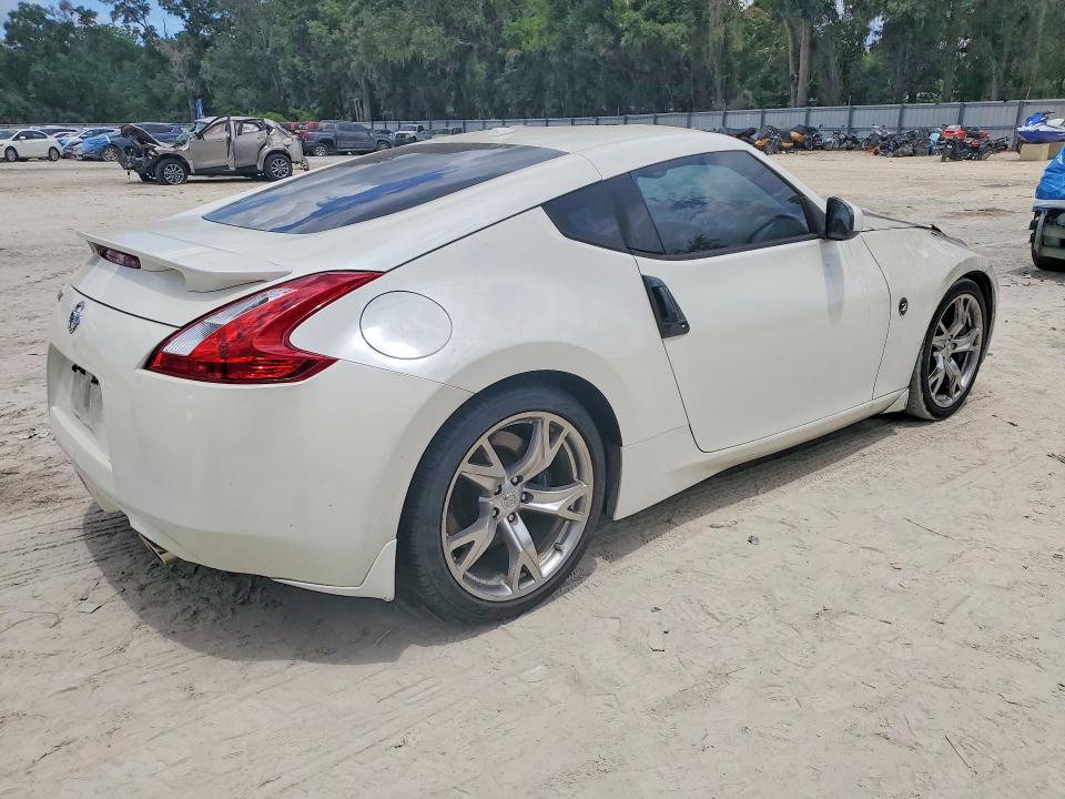 2010 Nissan 370z VIN JN1AZ4EH8AM506852 COPART salvage auction — ENGINE BURN, Fl - Cert Of Title Slvg Rebuildable, sold $725 on 2026-07-28 (photo 3)