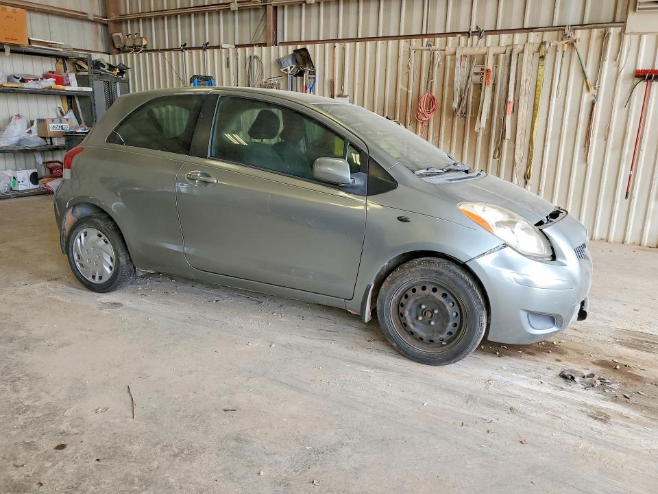 2010 Toyota Yaris VIN JTDJT4K37A5296164 COPART salvage auction — FRONT END, TX - SALVAGE VEHICLE TITLE, sold $650 on 2026-07-24 (photo 4)