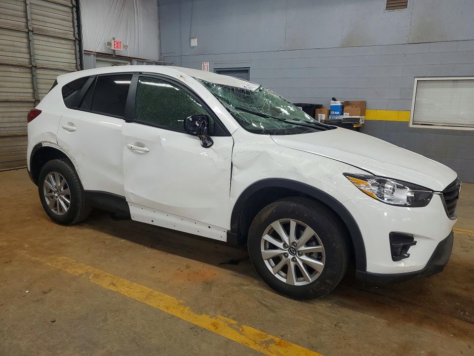 2016 Mazda Cx-5 VIN JM3KE2CY0G0843897 COPART salvage auction — ROLLOVER, Nc - Salvage Certificate Of Title, sold $175 on 2026-07-29 (photo 4)