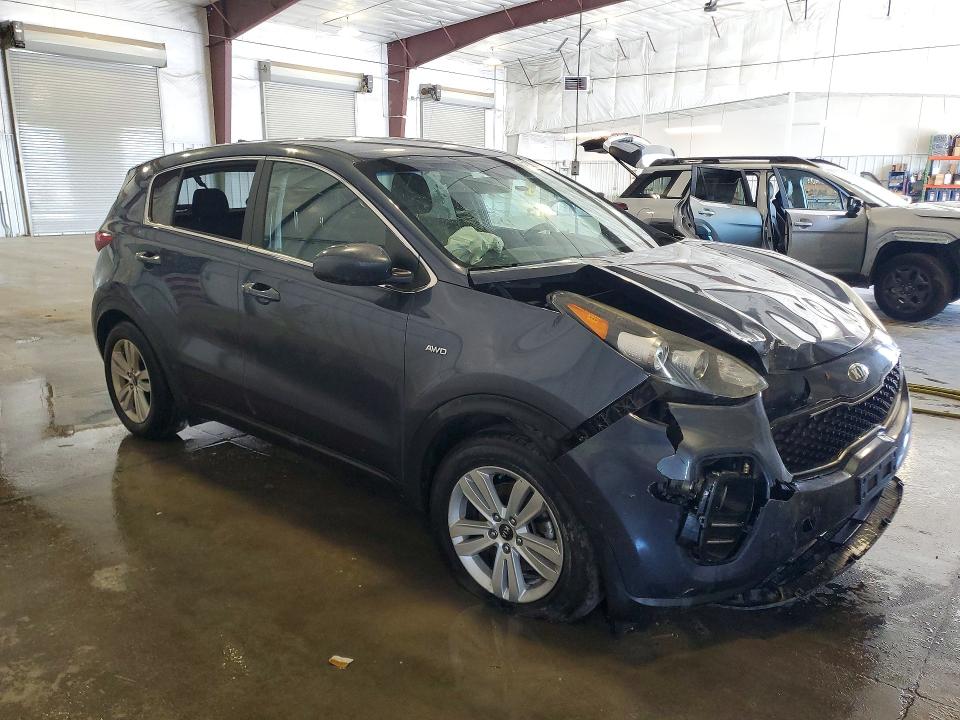 2018 Kia Sportage VIN KNDPMCAC7J7346360 COPART salvage auction — FRONT END, MN - CERT OF TITLE-PRIOR SALVAGE, sold $1,400 on 2026-07-27 (photo 4)