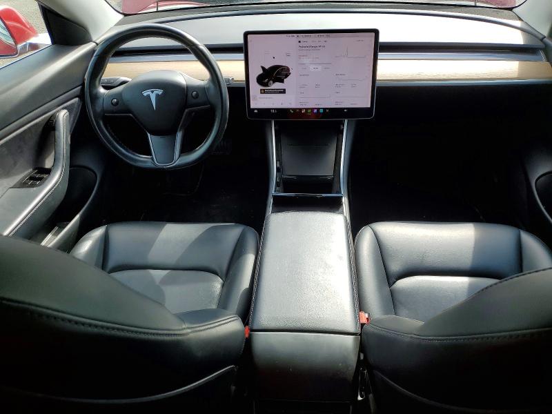 2018 Tesla Model 3 VIN 5YJ3E1EB1JF126997 COPART salvage auction — MINOR DENT/SCRATCHES, On - Permit Rebuilt - Unfit, sold $7,400 on 2026-07-03 (photo 8)