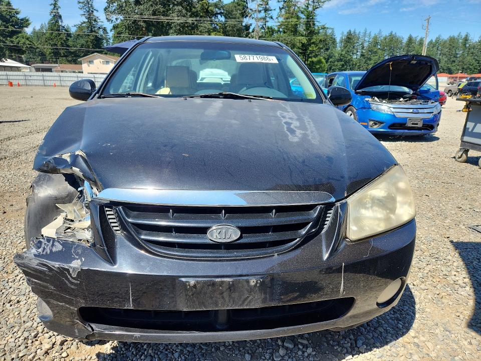 2005 Kia Spectra VIN KNAFE121555092723 COPART salvage auction — FRONT END, Wa - Bill Of Sale, sold $225 on 2026-07-07 (photo 5)