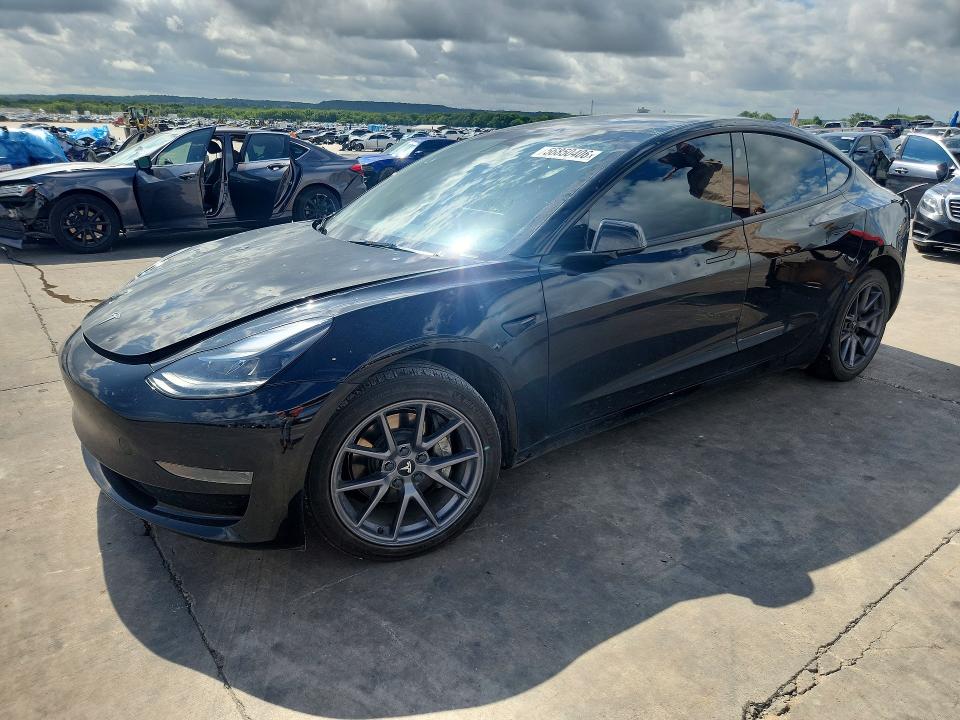 2023 Tesla Model 3 VIN 5YJ3E1EA8PF662118 — COPART salvage auction photo