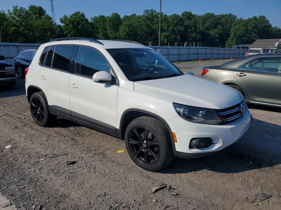 2017 Volkswagen Tiguan VIN WVGBV7AX2HK049114 COPART salvage auction — MINOR DENT/SCRATCHES, Pa - Cert Of Title, sold $4,000 on 2026-08-17 (photo 4)