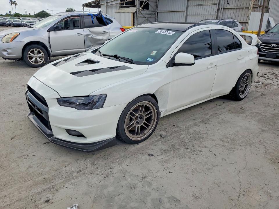 2014 Mitsubishi Lancer evolution VIN JA32W8FVXEU021204 COPART salvage auction — MECHANICAL, Tx - Certificate Of Title (P), sold $14,500 on 2026-07-28 (photo 1)