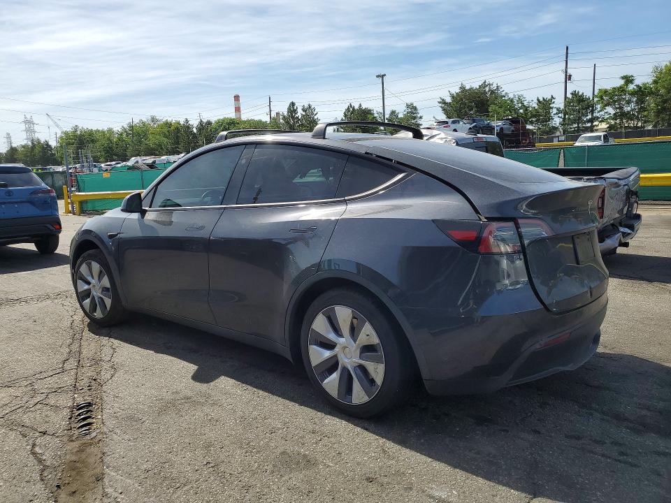 2024 Tesla VIN 7SAYGAEE8RF035542 COPART salvage auction — SIDE, Co - Public - Salvage Title, sold $11,000 on 2026-07-07 (photo 2)