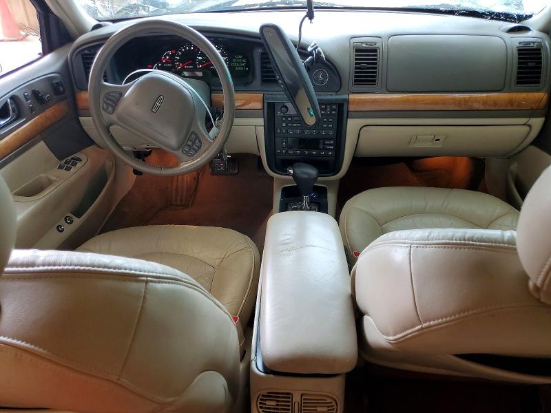 2001 Lincoln Continental VIN 1LNHM97V01Y720555 COPART salvage auction — FRONT END, TX - SALVAGE VEHICLE TITLE, sold $275 on 2026-07-17 (photo 8)
