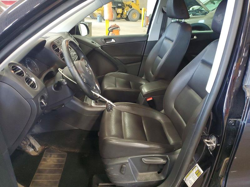 2014 Volkswagen Tiguan VIN WVGBV3AX3EW618744 COPART salvage auction — MINOR DENT/SCRATCHES, Mn - Certificate Of Title, sold $1,050 on 2026-07-16 (photo 7)