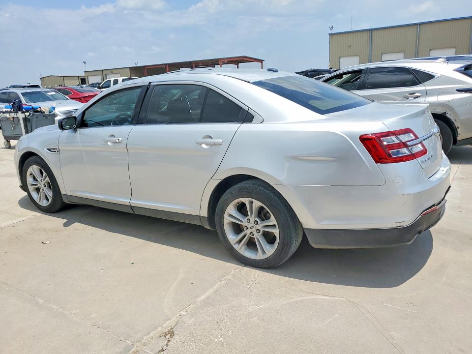2016 Ford Taurus VIN 1FAHP2D82GG129259 COPART salvage auction — SIDE, Tx - Certificate Of Title (P), sold $2,000 on 2026-07-03 (photo 2)