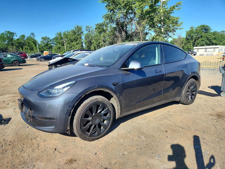 2023 Tesla Model y VIN 7SAYGDEE9PA034654 COPART salvage auction — SIDE, MD - CERT OF SALVAGE < 75% DAMAGE, sold $11,600 on 2026-07-07 (photo 1)