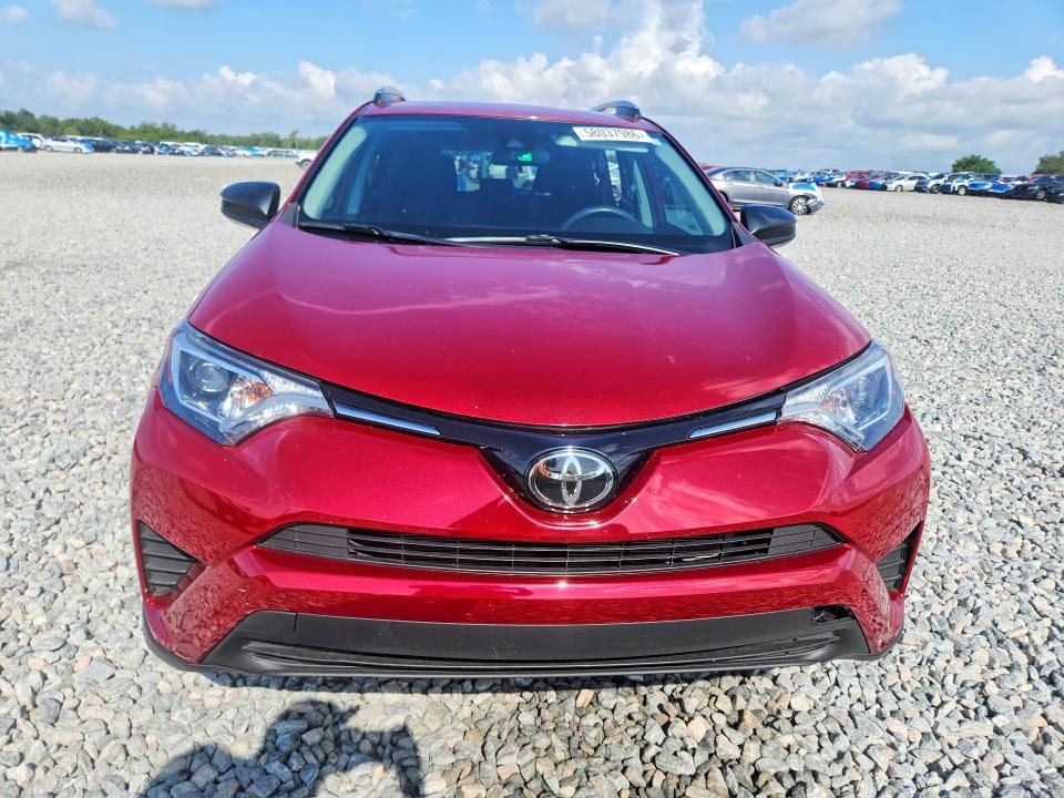 2018 Toyota Rav 4 VIN 2T3ZFREV7JW491985 COPART salvage auction — SIDE, Fl - Cert Of Title Slvg Rebuildable, sold $8,200 on 2026-07-02 (photo 5)