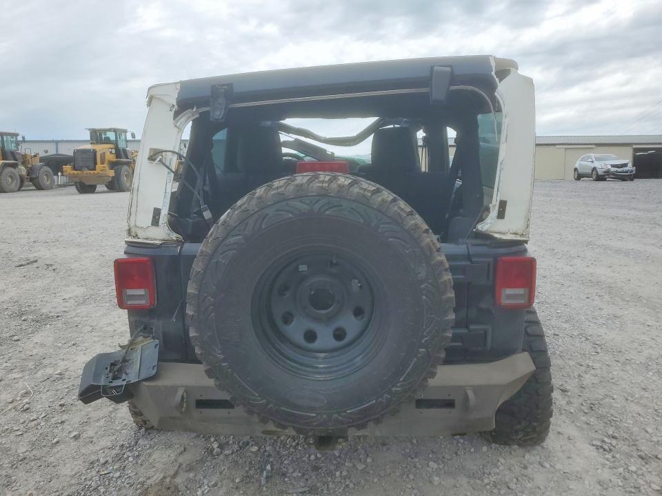 2011 Jeep Wrangler / VIN 1J4BA3H17BL610574 COPART salvage auction — ROLLOVER, Tn - Salvage Certificate, sold $1,000 on 2026-07-09 (photo 6)