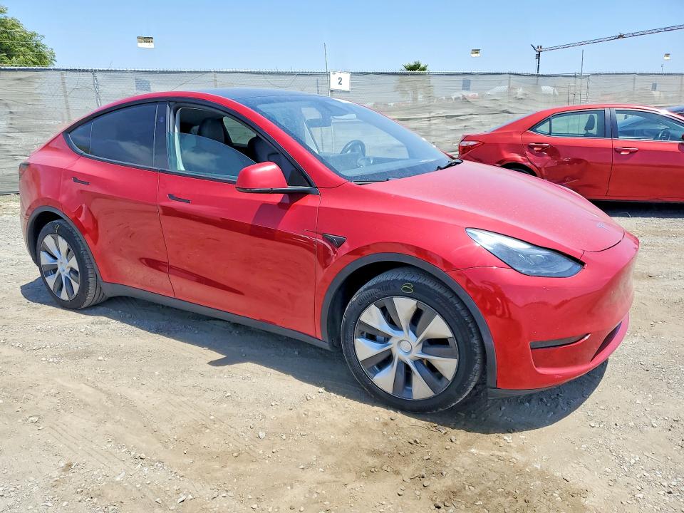 2023 Tesla Model y VIN 7SAYGDEE4PF800860 COPART salvage auction — REAR END, Ca - Salvage Certificate, sold $9,800 on 2026-07-21 (photo 4)