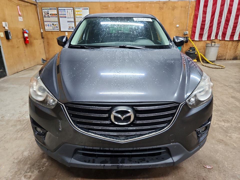 2016 Mazda Cx-5 VIN JM3KE4CYXG0797247 COPART salvage auction — SIDE, Mi - Certificate Of Title, sold $100 on 2026-07-29 (photo 5)