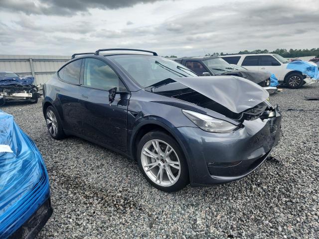 2023 Tesla Model y VIN 7SAYGDEE8PF872287 COPART salvage auction — FRONT END, Fl - Cert Of Title Slvg Rebuildable, sold $12,100 on 2026-07-10 (photo 4)