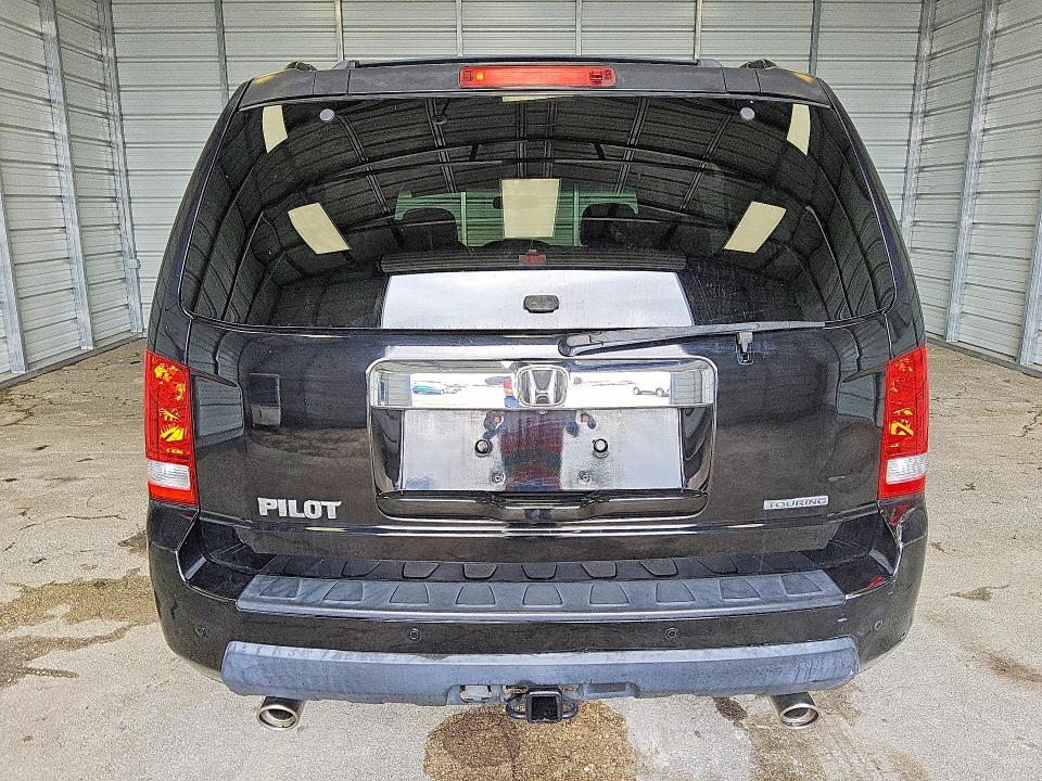 2009 Honda Pilot VIN 5FNYF38909B021757 COPART salvage auction — MINOR DENT/SCRATCHES, Fl - Certificate Of Title, sold $1,050 on 2026-07-09 (photo 6)