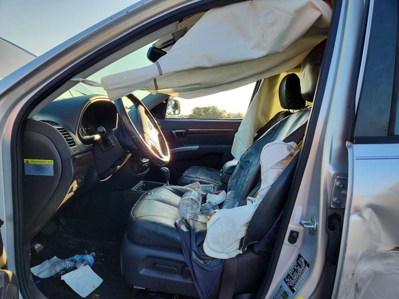 2012 Hyundai Santa fe VIN 5XYZK3ABXCG128084 COPART salvage auction — SIDE, Fl - Cert Of Title Slvg Rebuildable, sold $1,150 on 2026-07-16 (photo 7)