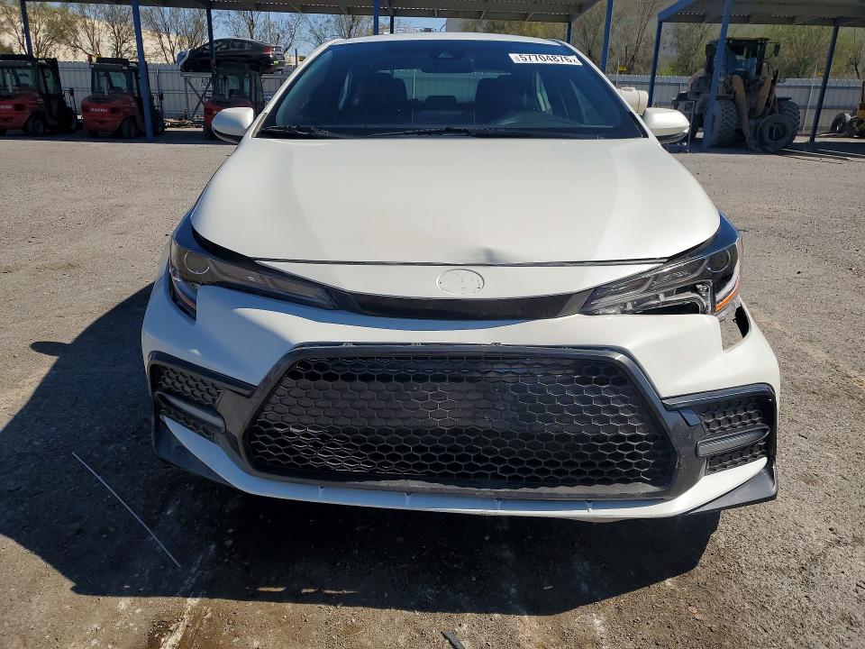 2021 Toyota Corolla VIN JTDS4MCE2MJ075701 COPART salvage auction — SIDE, Nv - Salvage Title, sold $6,300 on 2026-07-23 (photo 5)