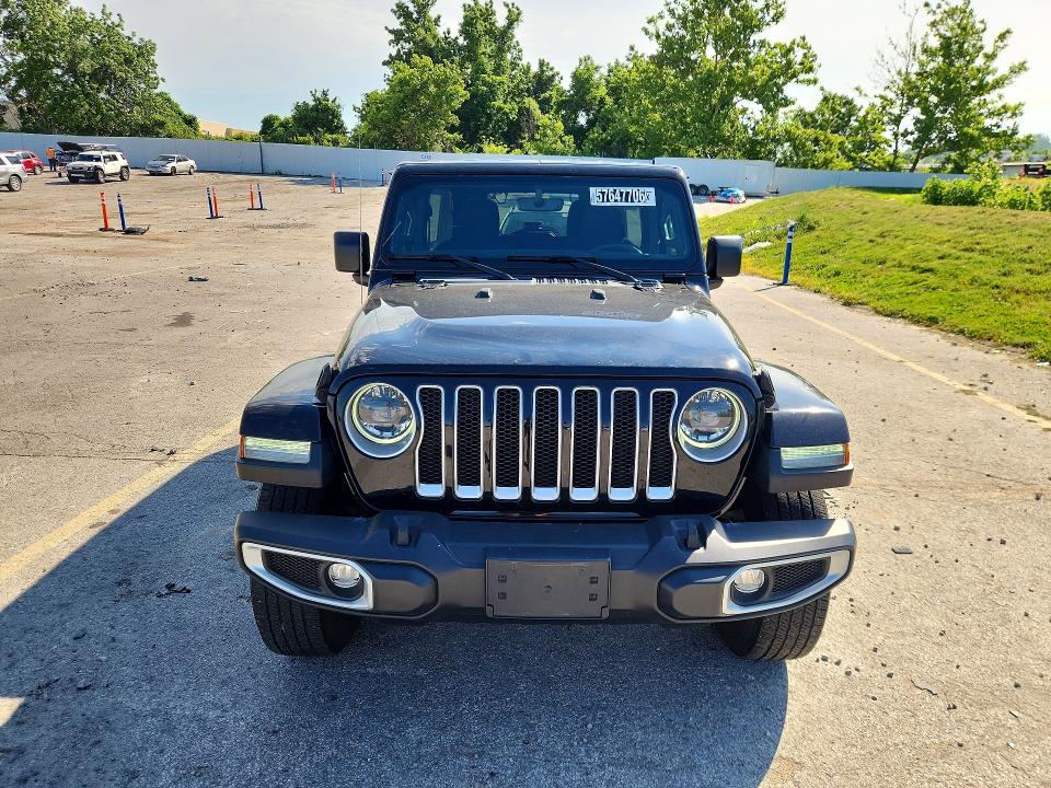 2023 Jeep Wrangler / VIN 1C4HJXEG2PW650454 COPART salvage auction — MINOR DENT/SCRATCHES, Mo - Certificate Of Title, sold $21,250 on 2026-07-02 (photo 5)