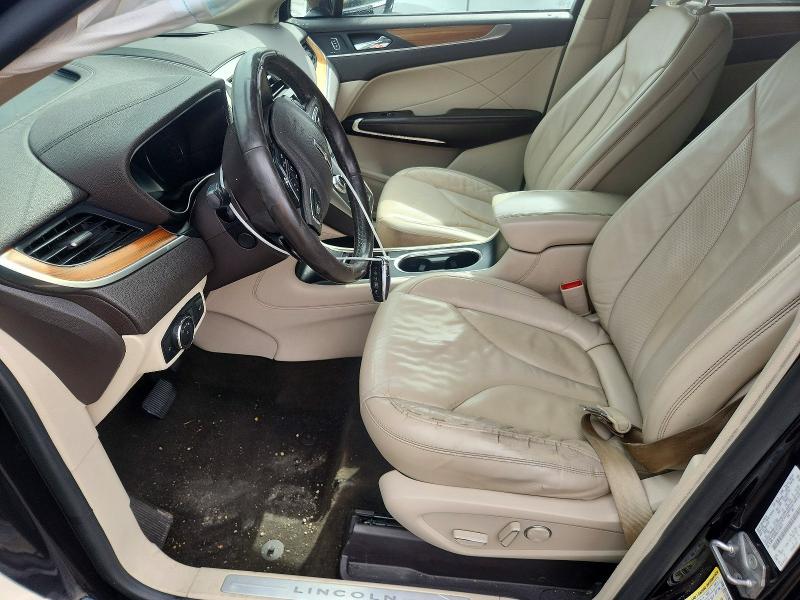 2019 Lincoln Mkc VIN 5LMCJ2D99KUL45871 COPART salvage auction — SIDE, Tx - Certificate Of Title (P), sold $3,500 on 2026-07-09 (photo 7)