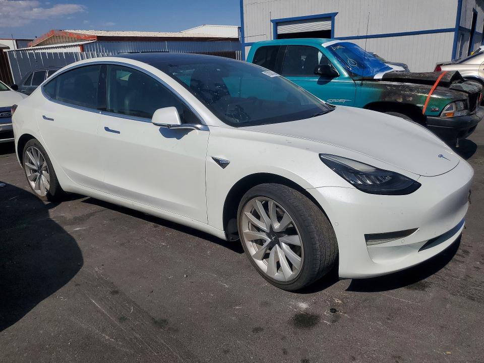 2020 Tesla Model 3 VIN 5YJ3E1EA3LF614634 COPART salvage auction — MINOR DENT/SCRATCHES, Nv - Certificate Of Title (P), sold $1,050 on 2026-07-13 (photo 4)