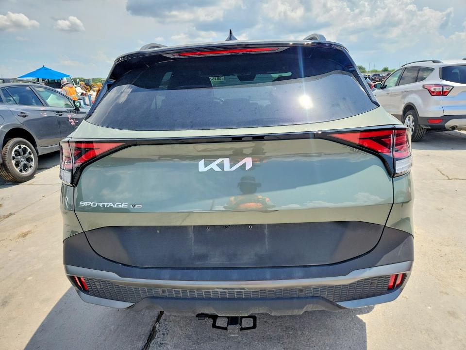 2024 Kia Sportage VIN 5XYK7CDF2RG230442 COPART salvage auction — SIDE, Tx - Salvage Vehicle Title, sold $14,300 on 2026-07-02 (photo 6)
